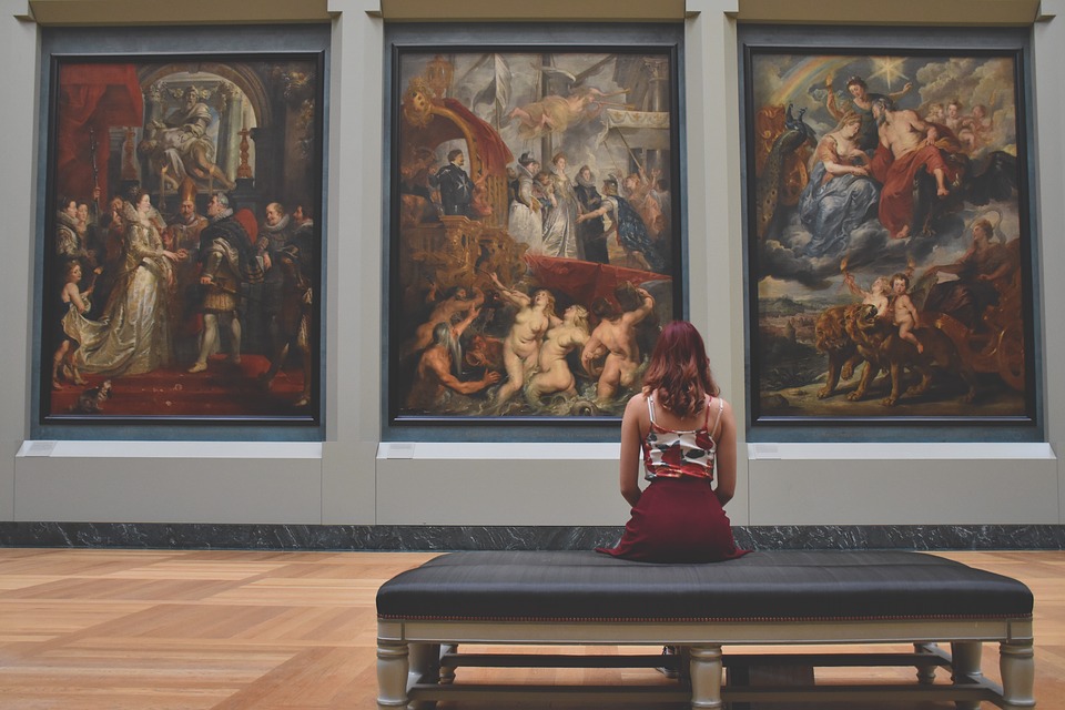 woman sitting in museum